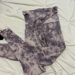 Lululemon purple tie-dye leggings with crisscross waist